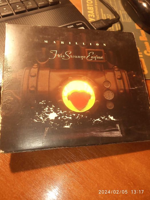 СД Marillion – This Strange Engine 1997 год