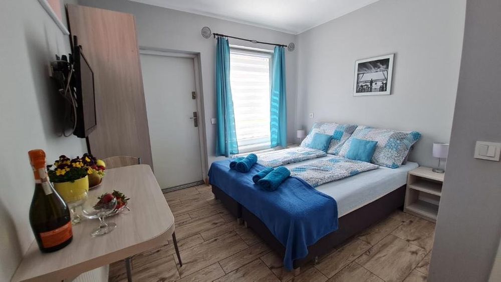 Bela-apartamenty, bezpłatny parking, faktura