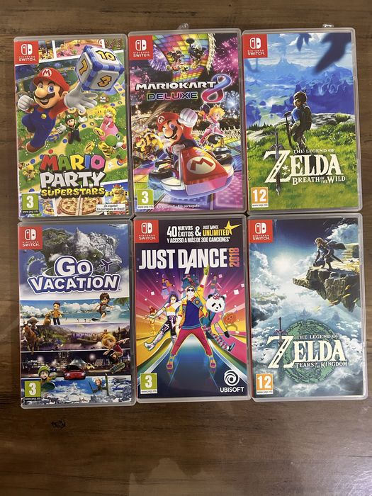 Nintendo switch com 4 comandos e 6 jogos