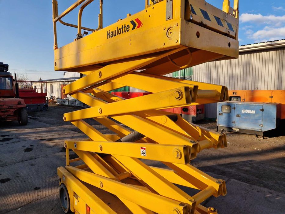 Ножничний підйомник Haulotte Compact 10N, акамуляторний, пеканіска