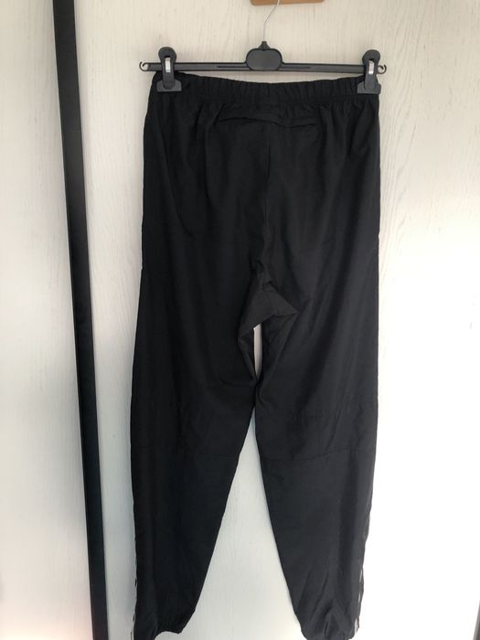 Czarne ortalionowe spodnie dres nike uniwersalne w bdb stanie