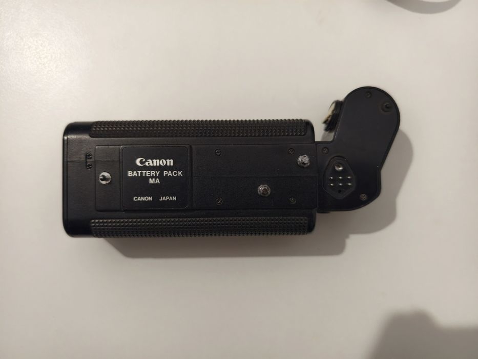 Canon A-1 + Canon FD 50mm 1.4 + Canon Motor Driver MA + canon Baterry pack MA