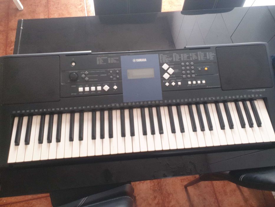 Orgao psr e333 teclado completamente  novo com carregador