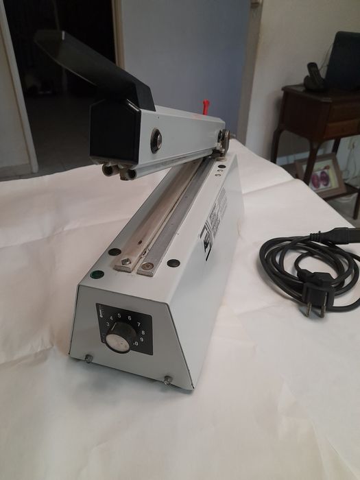 Máquina  de fechar sacos  23 5 cm