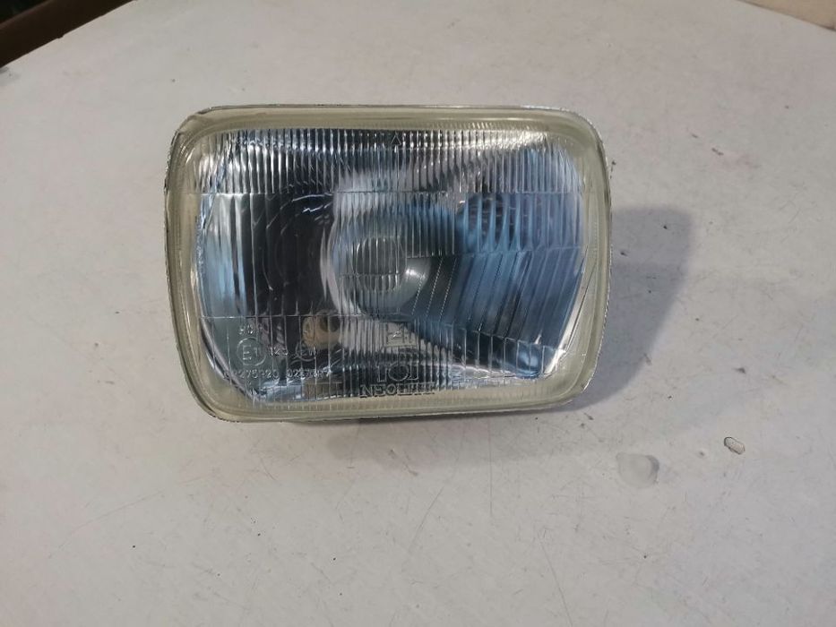 farol optica nissan patrol / mitsubishi L200 L300/toyota hilux /jeep cherokee (novo)