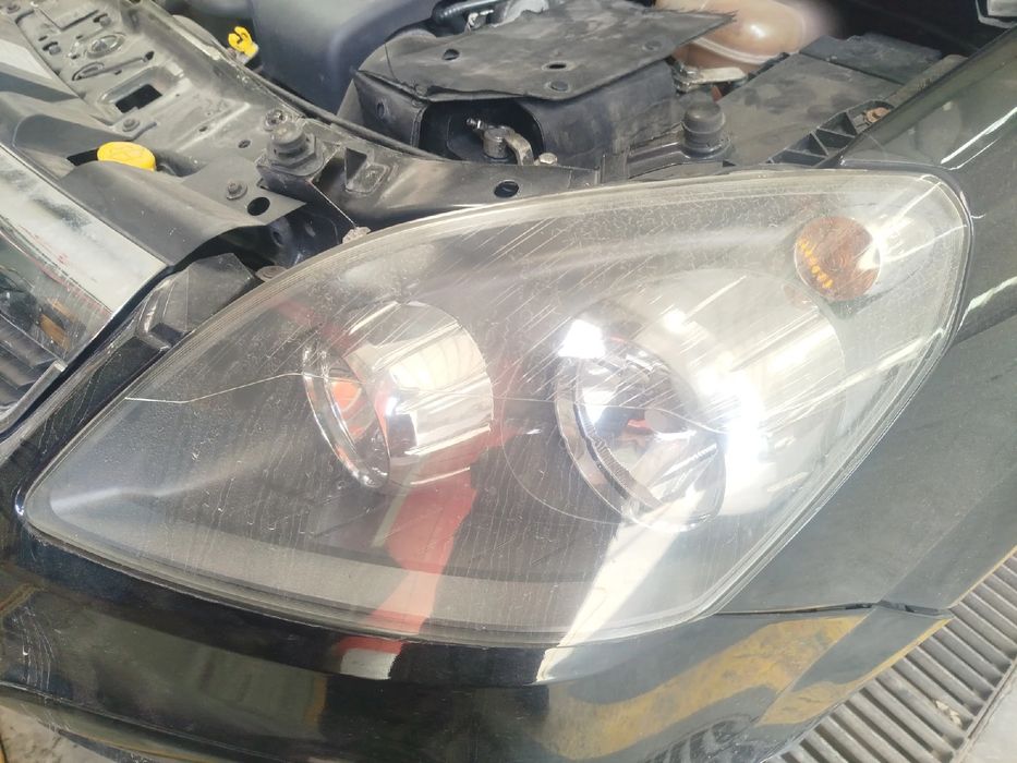Ótica / farol esquerda VAUXHALL Zafira B (A05)