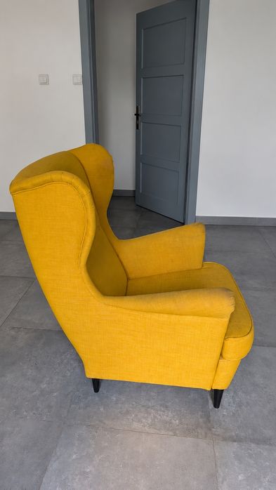 IKEA STRANDMON żółty fotel uszak