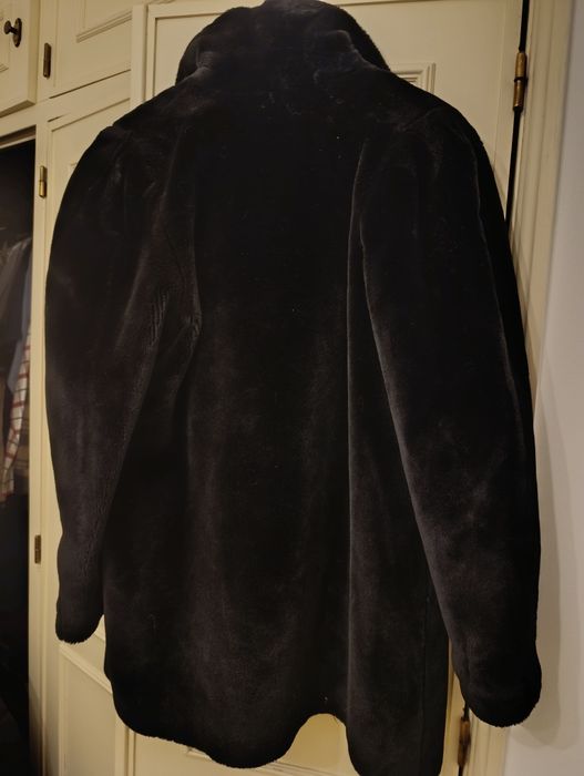 Casaco de pêlo preto