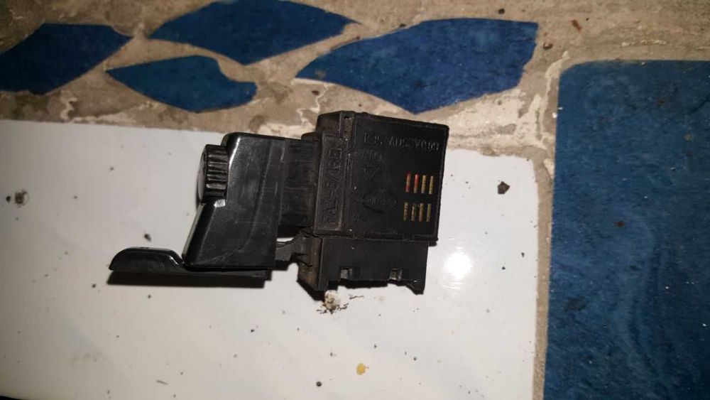 Кнопка болгарки з регулятором та кнопка дрелі