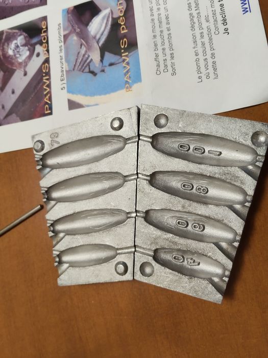 Antigo molde para chumbeiras de pesca