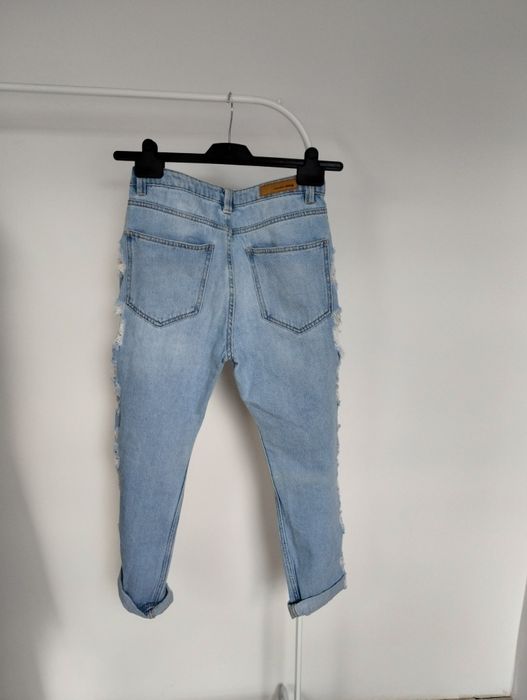 Jeansy z dziurami  Sinsay