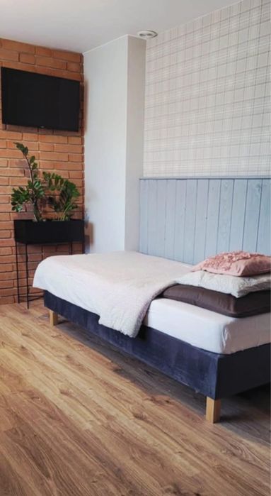 Pokoje hotelowe Gosciniec , kuchnia , poloje z łazienkami pralka.