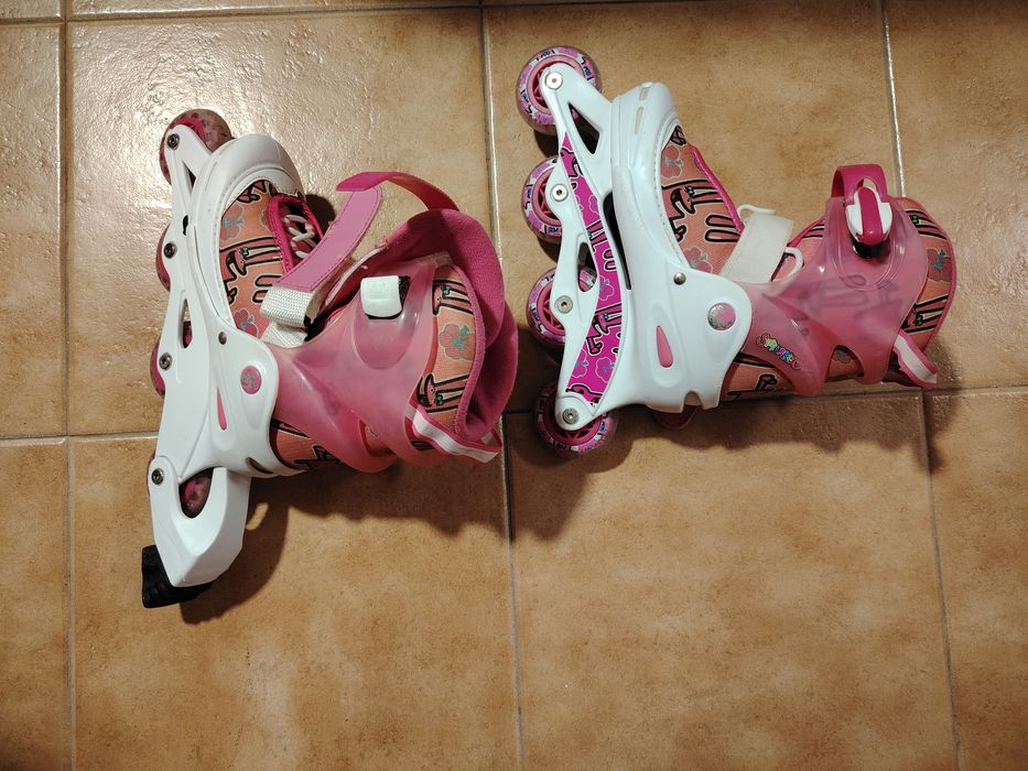 Patins em linha rosa e branco da deeply com protetores