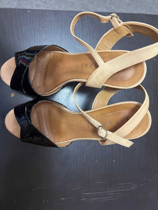 Sapatos usados como novos
