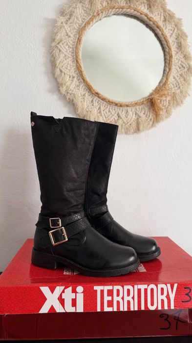 Botas cano alto