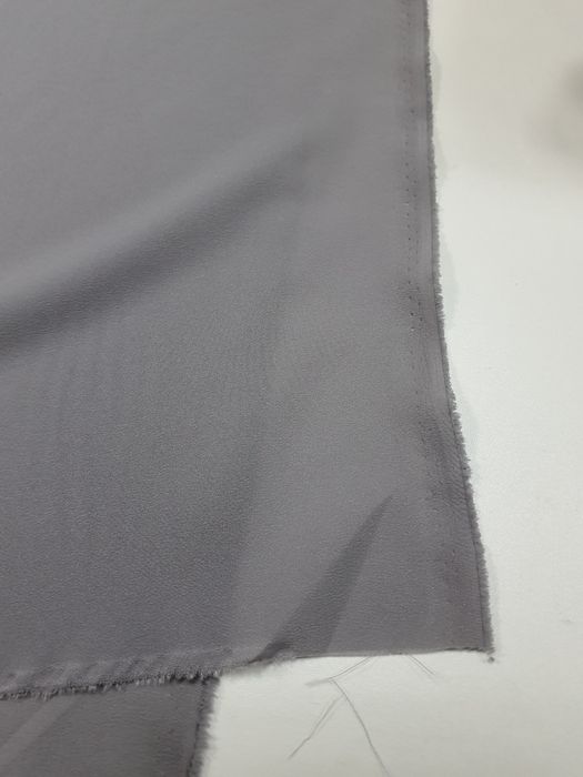 Tkanina delikatna popiel szer.140 cm.