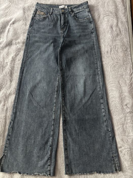 Джинси широкі, висока посадка