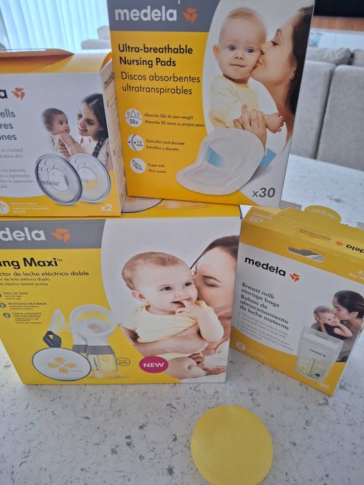 Máquina extratora de leite dupla Medela + acessórios