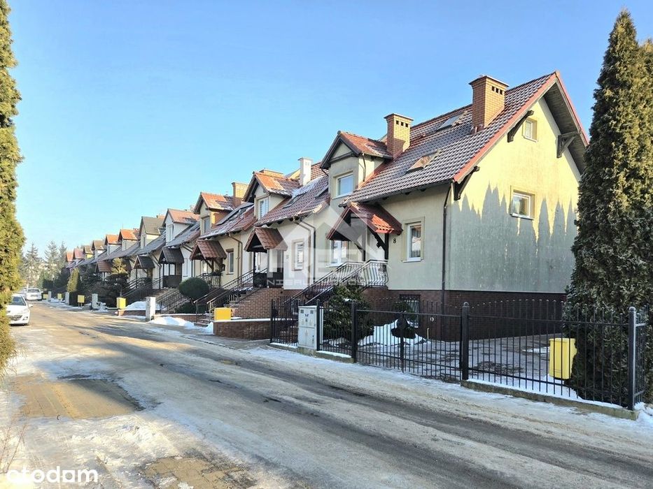 Dom skrajny w szeregu z garażem i działką