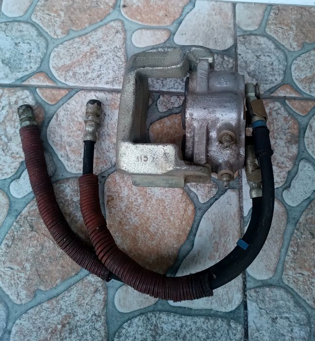 Суппорт ВАЗ Нива 2121 21214 левый новый