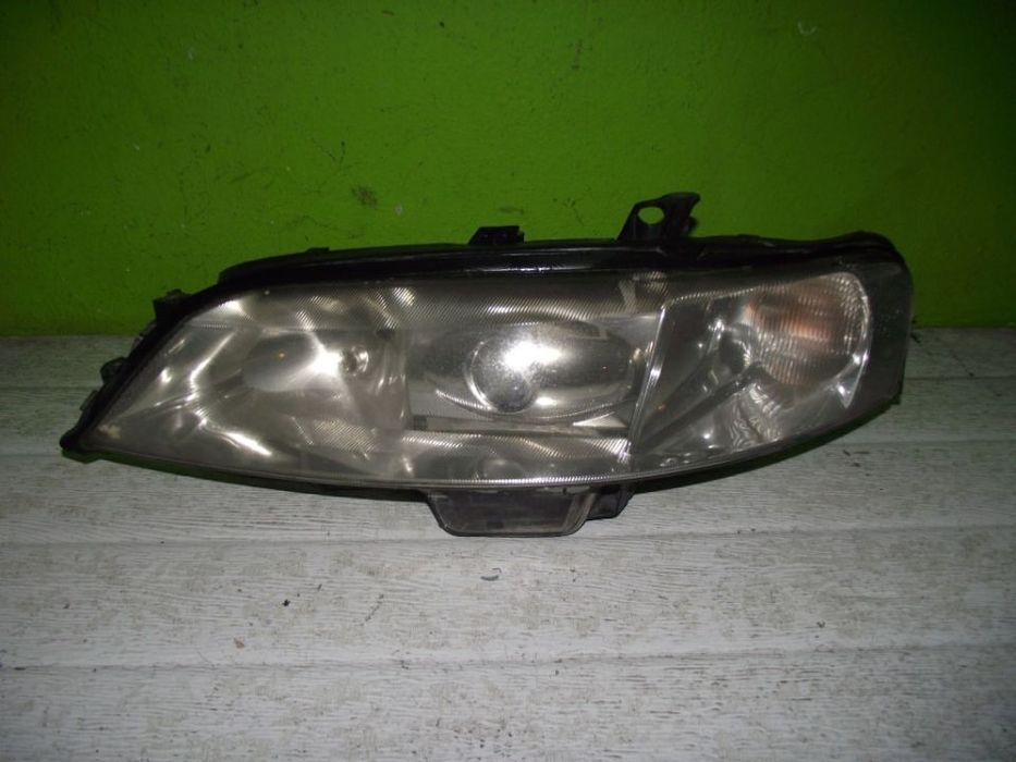 Farol de Xénon Esquerdo Opel Vectra - 2001 / 2002 - F1124