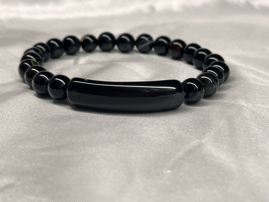 Чоловічі браслети з натурального каміння.
