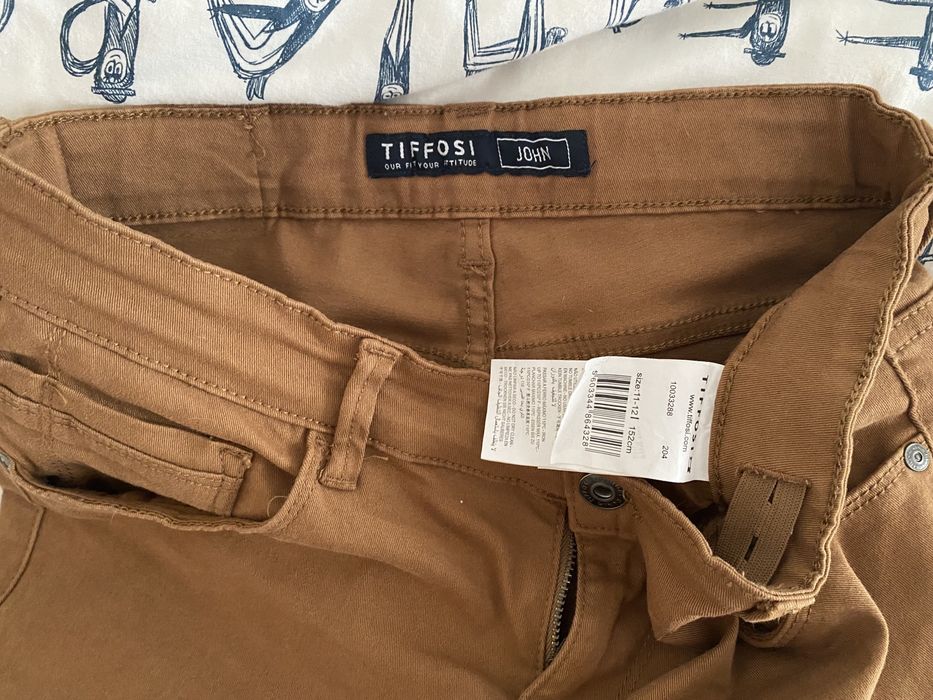 Calça nova tifossi 11-12 anos