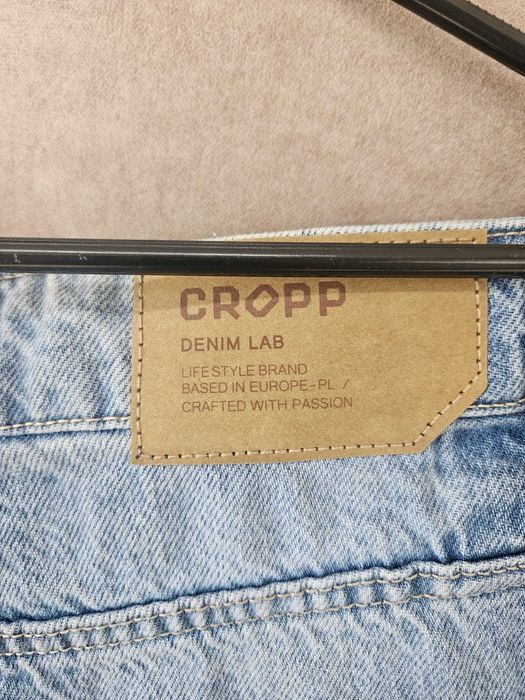 Spodnie jeansowe CROPP Super Baggy jasnoniebieskie przecierane roz 28/30