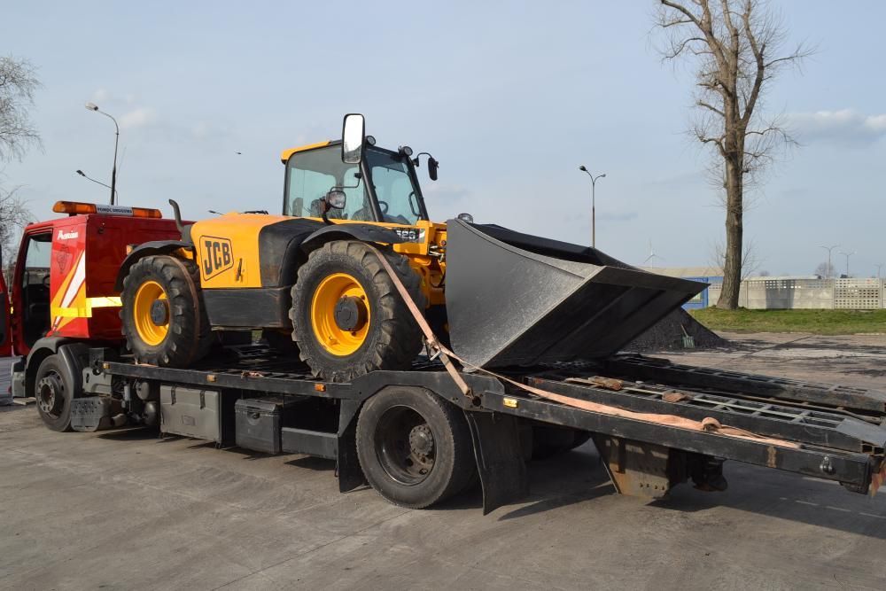 Transport laweta przewóz maszyn rolniczych  budowlanych wciągarka