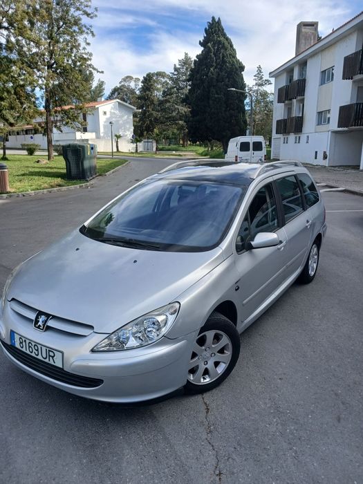 Peugeot 307 de 7 lugares 2004 gasolina super económico ac carregado