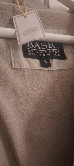 Casaco de penas comprido