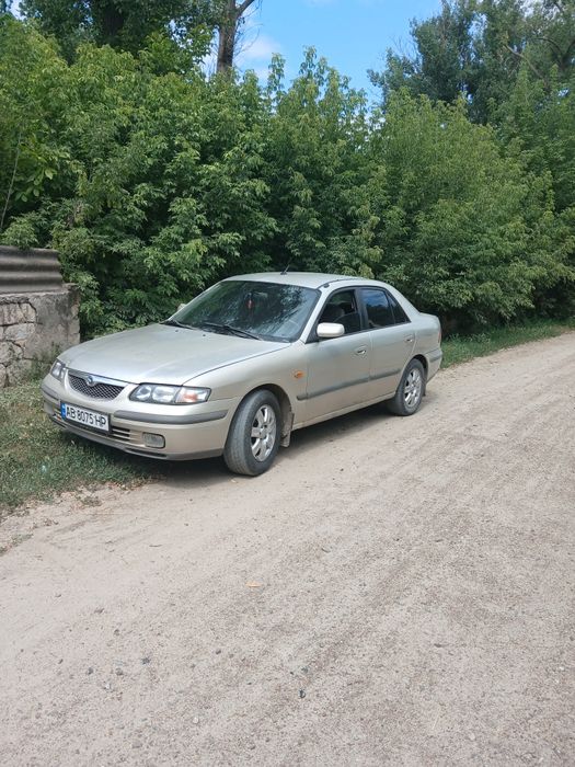 Мазда 626 седан 1999 рік