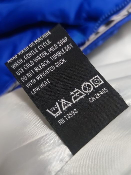 Męska kurtka puchowa L marki Helly Hansen w intensywnym kolorze nieb