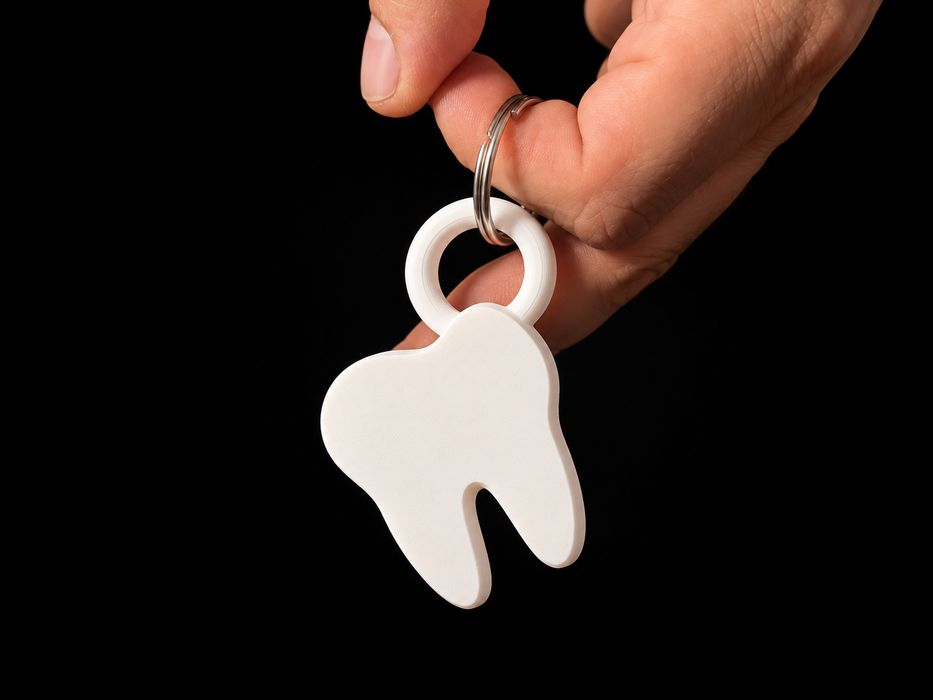 Porta-chaves em forma de dente minimalista