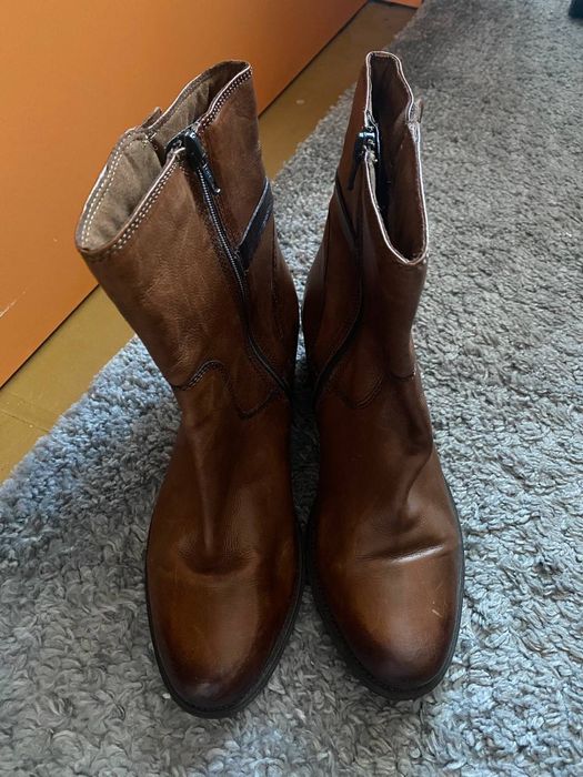 черевики Clarks.