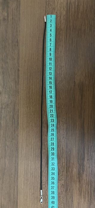 Срібний хрестик дитячий із шнурочком