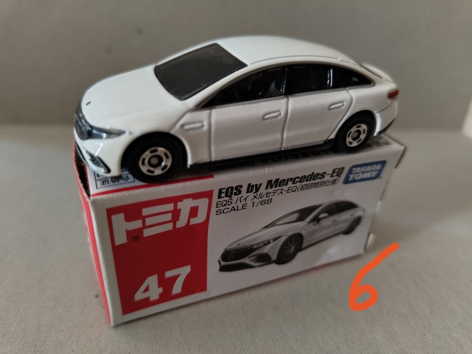 Carros tomica com caixa