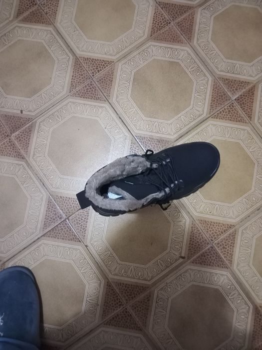 Bota de homem meio cano