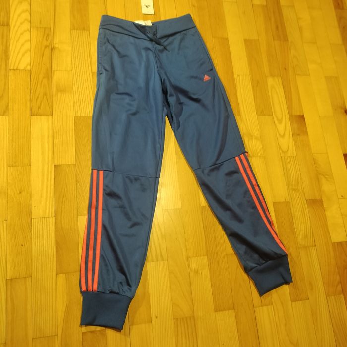 Dziewczęce nowe spodnie dresowe Adidas 164