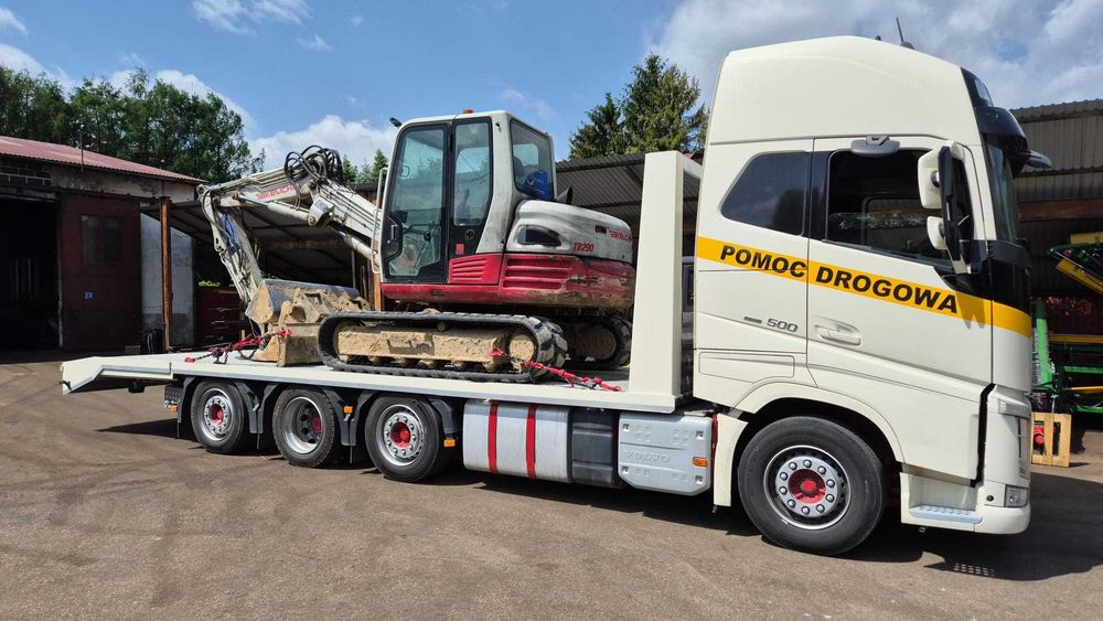 Transport maszyn budowlanych do 19 ton laweta pomoc drogowa