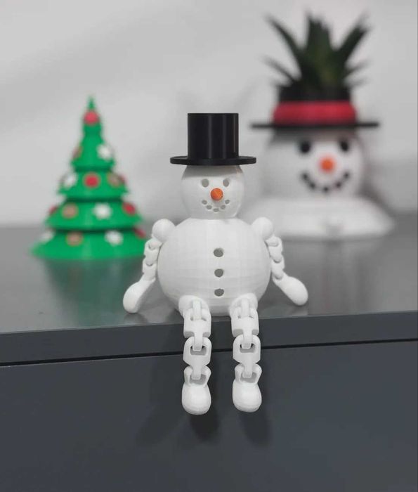 Сніговик. Сидячий сніговичок