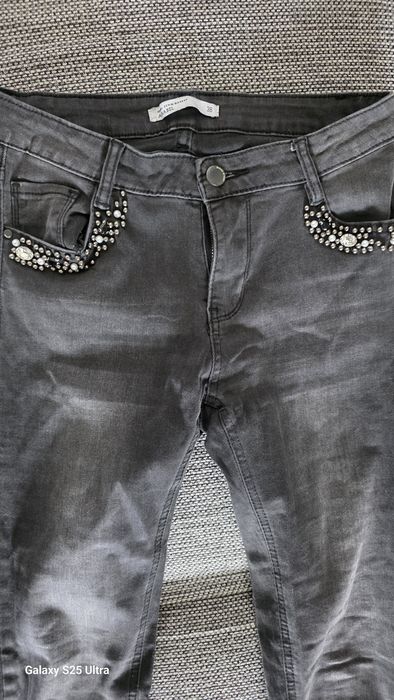 Damskie jeansy skinny z kryształami 38