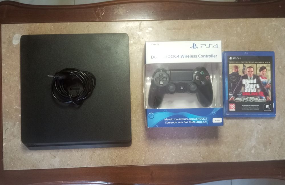 PS4 Slim 500GB | New Controller + GTA V | Like New - €20064584271737474123