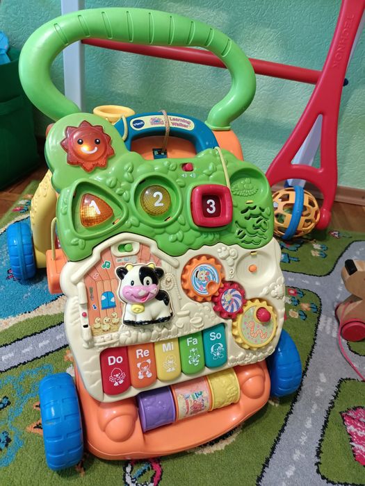 Лот іграшок , каталка goki  ,ходунки музичні  з ігровою панеллю Vtech