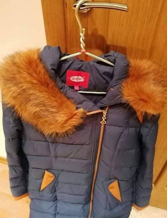 Продам пуховик 46р