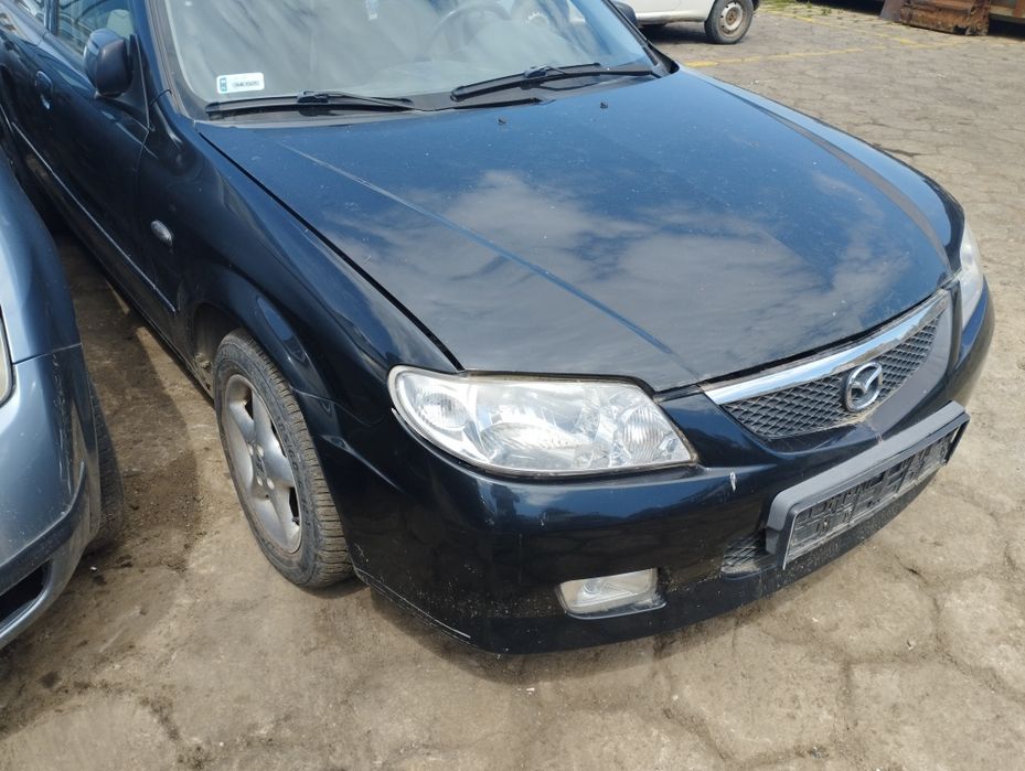 Mazda 323f lift zderzak przód tył klapa tylna maska czarne reflektor lampa