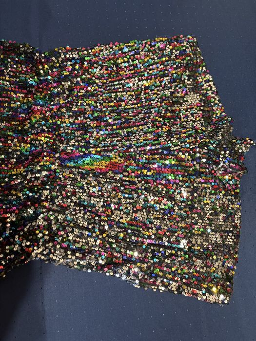 Комбінезон  в паєтках 16 розмір