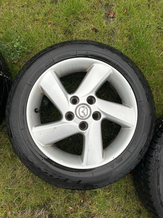 Komplet alufelg Mazda z oponami zimowymi Dębica Frigo