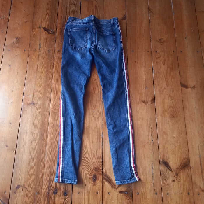 spodnie jeans z lampasami 38 M