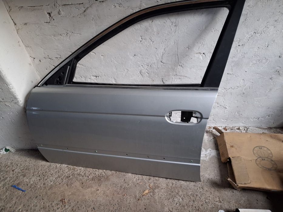 Дверка ліва передня BMW E39